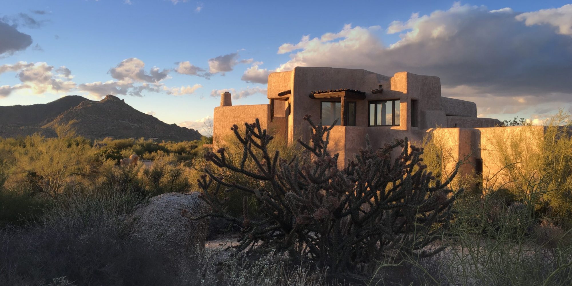 a rammed earth home in the desert